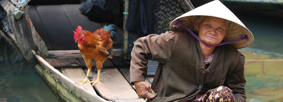 Chicken lady Perfume River, Vietnam