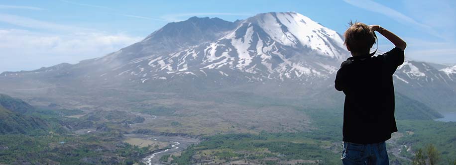 visitor taking photo of Mount St. Helens